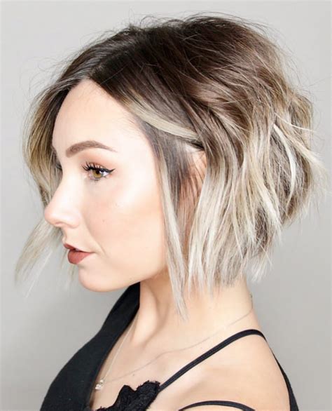 Long side bangs flow into this cut seamlessly. . Short bob thick hair
